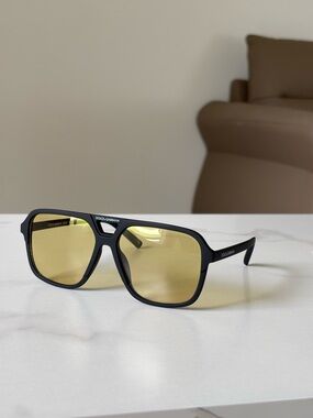 Dolce & Gabbana Black Frame Sunglasses with Yellow Lenses - Women's